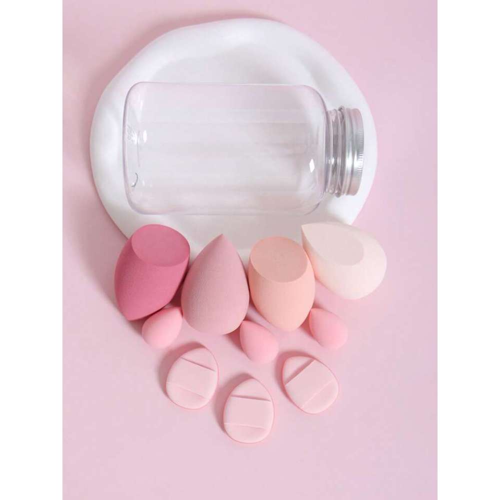 Pink and white oval-shaped items on a pink background