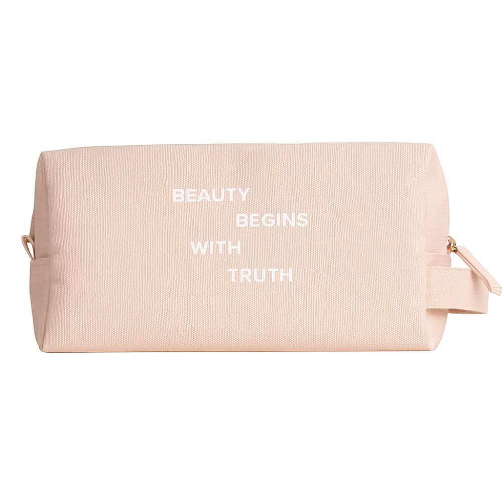 Beige toiletry bag with 'Beauty Begins with Truth' text on a white background