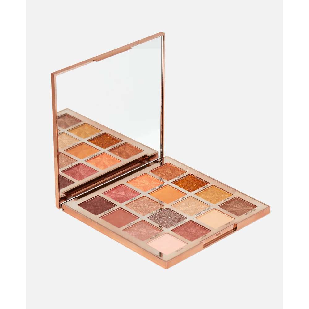 Makeup palette with various shades of eyeshadow on a white background