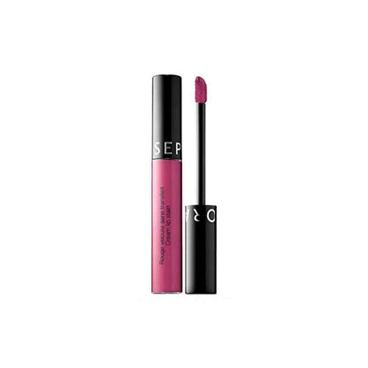 Pink lip gloss with black applicator on a white background