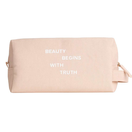 Beige toiletry bag with 'Beauty Begins with Truth' text on a white background