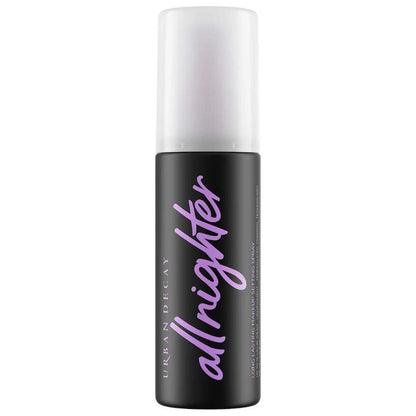 Black and white bottle of Urban Decay All Nighter setting spray on a white background