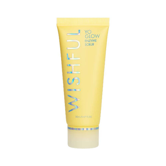 Yellow tube of Wishful Yo Glow Enzyme Scrub on a white background