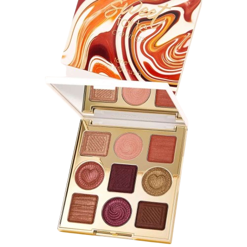 Makeup palette with swirled design on top, featuring various shades of brown and pink.