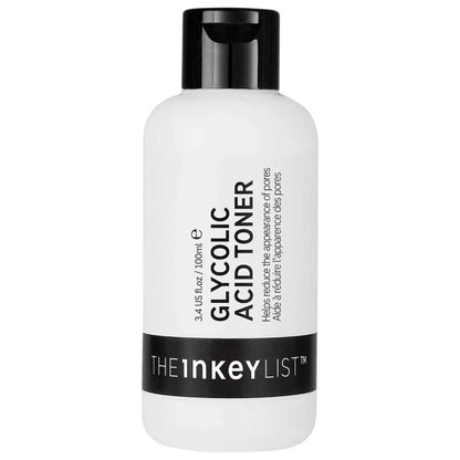 White bottle of Glycolic Acid Toner with black cap and label on a white background
